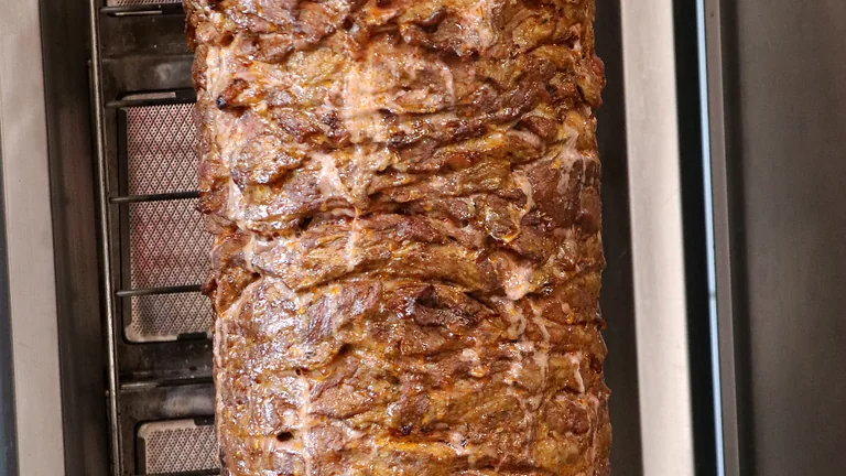Real sliced lamb layered on the doner at Captain Kitchen
