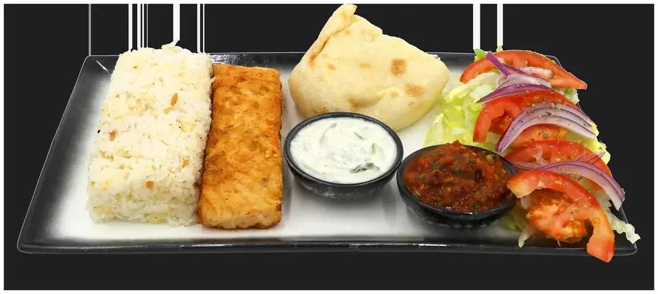 Fish Platter with salmon, rice, bread, mixed salads and dips at Captain Kitchen